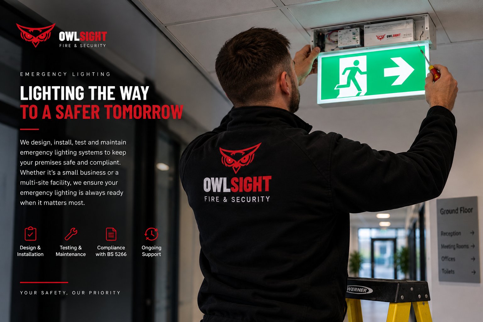 Owlsight engineer installing an illuminated emergency exit sign